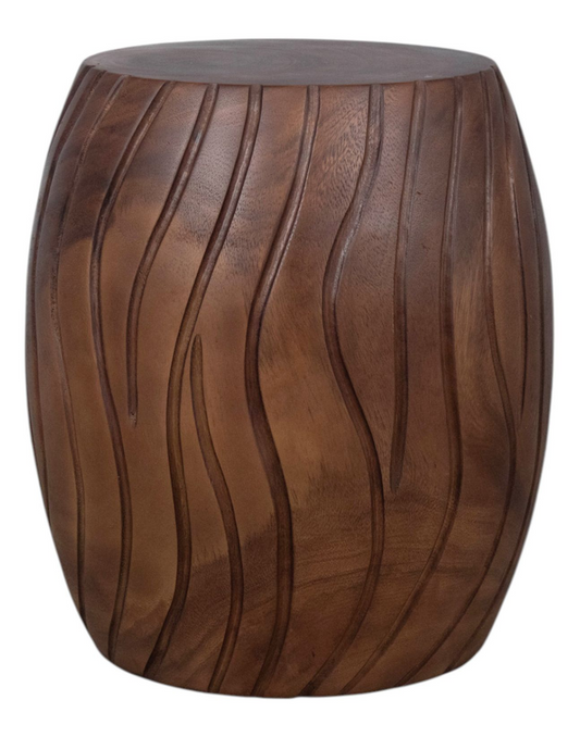 Round carved wood drum table with wavy vertical grooves and a warm brown textured finish.
