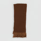 brown textured throw with woven fringe and soft looped weave