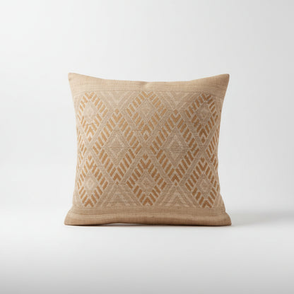 tan and beige geometric woven pillow with diamond and chevron pattern and textured artisan weave