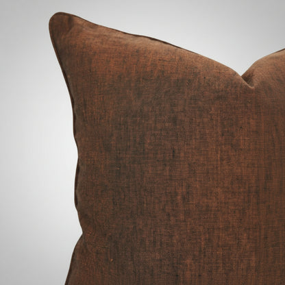 handmade solid brown linen pillow with natural textured weave and plush down fill
