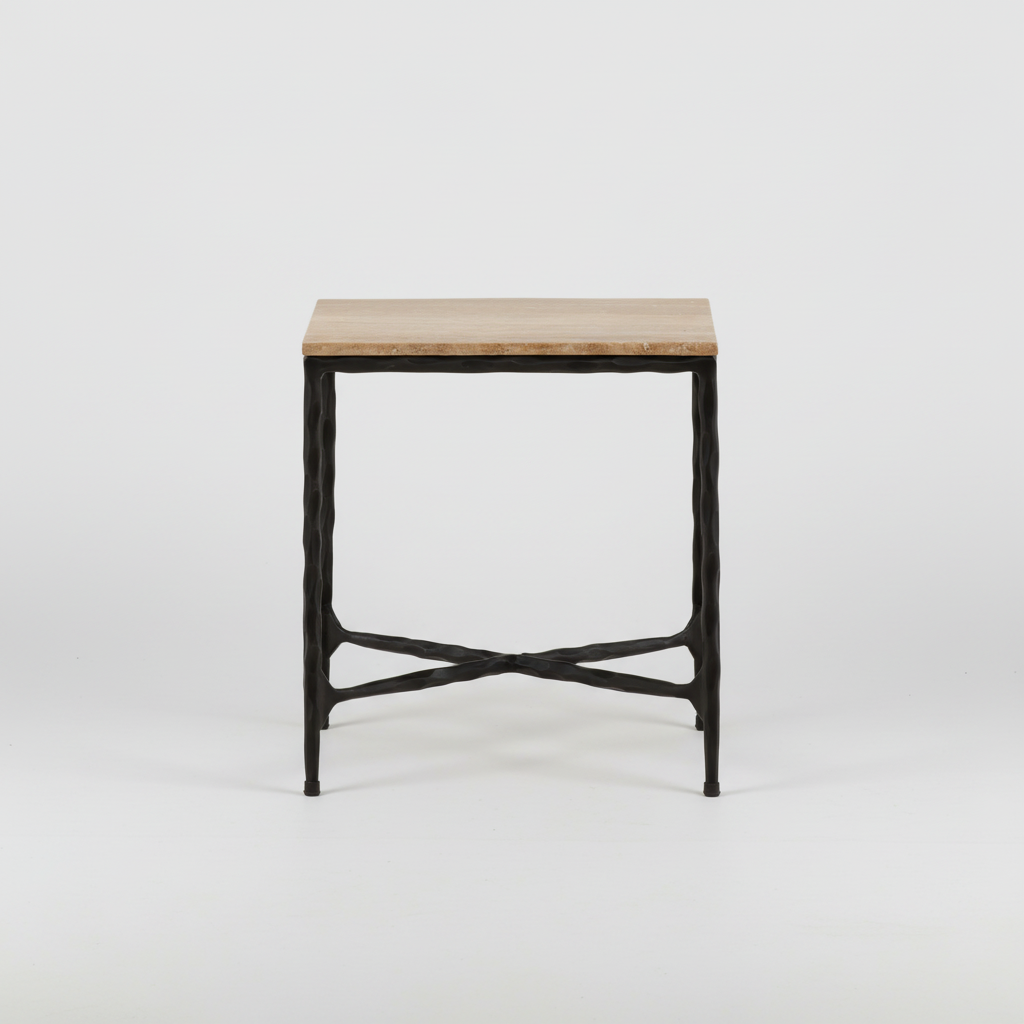 Iron side table with a textured black metal frame and a rectangular stone top, featuring crossed metal supports near the base.