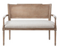French cane settee with a woven shield back, light wood frame, and upholstered seat in a farmhouse‑inspired style.
